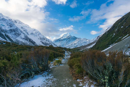 Beautiful winter mountain landscape with snow and hiking path. Aoraki, New Zealand 