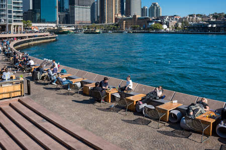 Sydney, Australia - July 23, 2017: Circular Quay Sydney cityscape with people relaxing at al fresco...