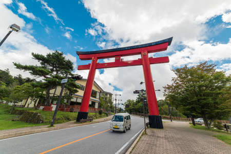 Togichi, Japan - September 9, 2016: Red Torii gate on the road to Nikko town in Japanのeditorial素材