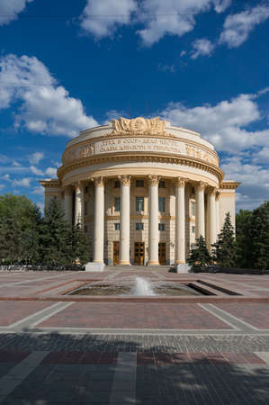 Volgograd, Russia - June 9, 2018: Trade Unions palace of culture landmark building. Soviet architecture style. Cyrillic text reads Labour in USSR is the matter of honour, glory, valour and heroismのeditorial素材