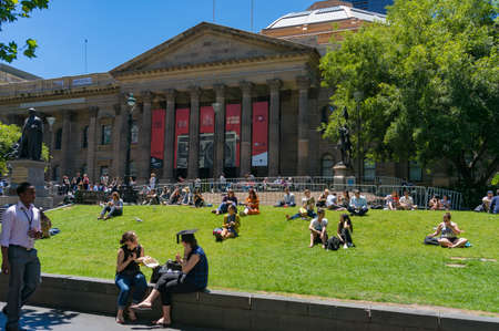 Melbourne, Australia - December 7, 2016: Sudents, tourists and locals enjoying sunny weather in front of State Library Victoriaのeditorial素材