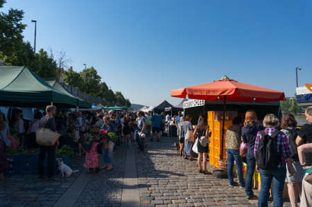 Prague, Czech Republic - May 26, 2018: Farmers Market Naplavka with people and stallholders with fresh produceのeditorial素材