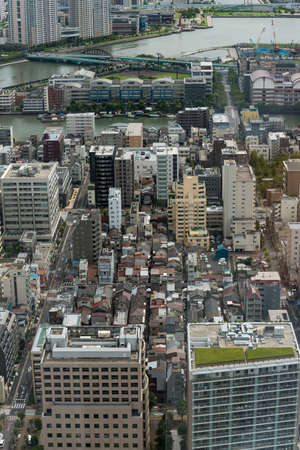Tokyo, Japan - August 30, 2016: Aerial view of Tokyo residential suburb with residential and...