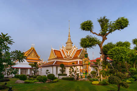 Bangkok, Thailand - December 24, 2015: Wat Arun temple grounds with temple palace buildings and landscaped parkのeditorial素材