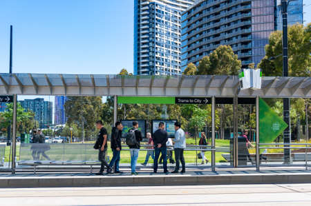 Melbourne, Australia - December 7, 2016: People waiting on tramway station to Melbourne CBD. MElbourne public transport infrastructureのeditorial素材