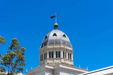 Melbourne, Australia - December 7, 2016: Cupola of Royal exhibition Building in Melbourne with Australian flagのeditorial素材