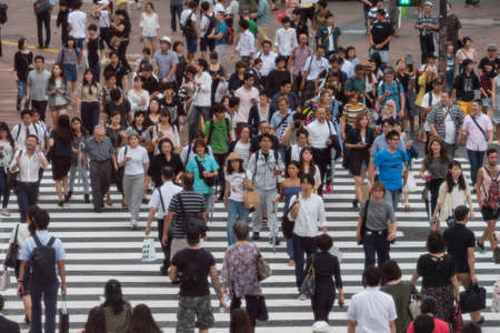 Tokyo, Japan - August 30, 2016: People in Tokyo. View of Shibuya Crossing with people walking