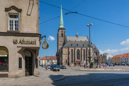 Pilsen, Czech Republic - May 26, 2018: Pilsen town square with historic St Bartholomew cathedral and...