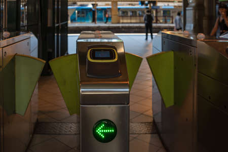 Melbourne, Australia - December 7, 2016: Electronic Myki Tap On Tap Off ticket gate system at Flinders Station in Melbourne, Australia. Closed subway metro automatic ticket controlのeditorial素材