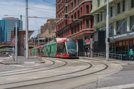 Sydney, Australia - January 26, 2020: Modern red tramway on George street in Sydney CBDのeditorial素材