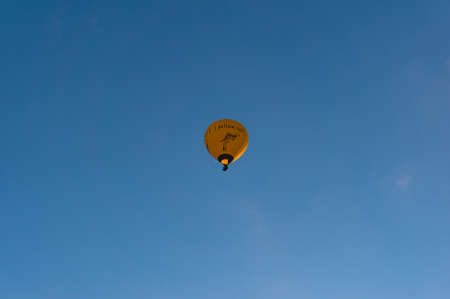 Melbourne, Australia - June 18, 2017: Yellow Tail wine brand hot air balloon in the blue sky. Yellow Tail is an Australian brand of wine produced by Casella Family Brandsのeditorial素材