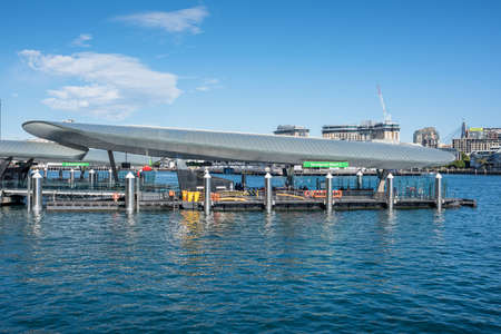 Sydney, Australia - July 23, 2017: Barangaroo wharf, ferry station with people waiting for the ferry. Public transport infrastructure in Sydney, Australiaのeditorial素材