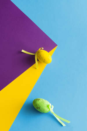 2021 Easter creative composition. colorful eggs watching from above. Minimal background.の写真素材