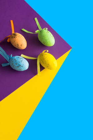 2021 Easter creative composition. colorful eggs watching from above. Minimal background.