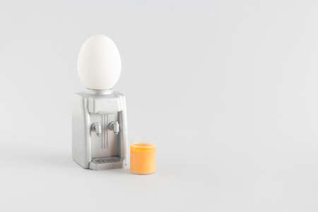 2021 Easter unique composition. Pour the Egg into a glass on a water machine. Holiday and food...