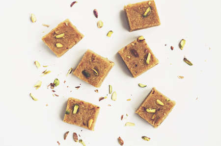 Homemade besan coconut burfi, traditional indian dessert for diwali festival celebrationの写真素材