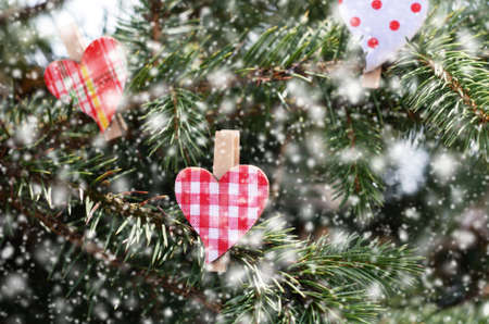 Winter decoration with christmas red hearts and snowflakesの写真素材