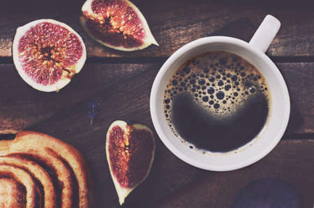 Cup of black coffee on wooden tray, table top view