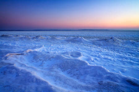 Winter landscape with sunset sky. Composition of nature. の写真素材
