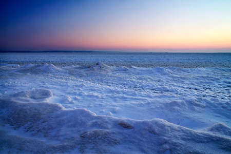 Winter landscape with sunset sky. Composition of nature. の写真素材