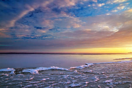 Winter landscape with sunset sky. Composition of nature. の写真素材