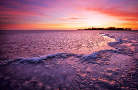 Winter landscape with sunset fiery sky. Composition of nature.の写真素材