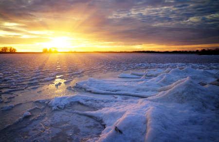 Winter landscape with sunset sky. Composition of nature.の写真素材