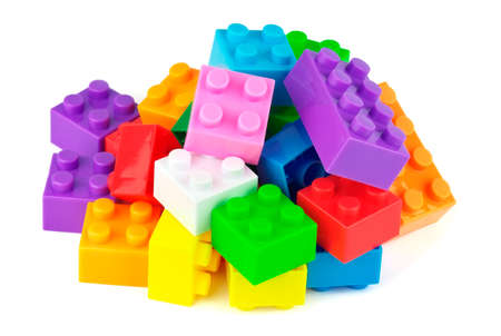 Toy colorful plastic blocks isolated on white の写真素材