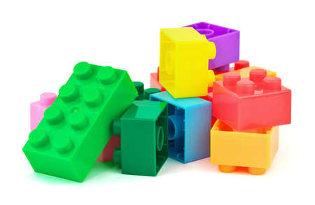 Toy colorful plastic blocks on white の写真素材