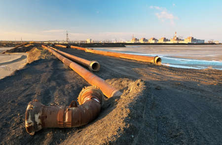 Nuclear power plant units, pipes & coal pilesの写真素材