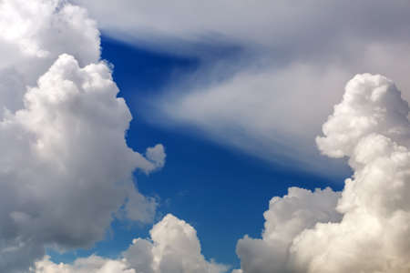 Fluffy clouds in the blue sky.の写真素材