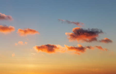 Sunset colorful sky with clouds as backgroundの写真素材