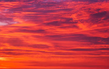 Beautiful fiery orange sky during sunset or sunrise.の写真素材