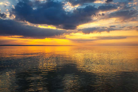Sunset on the beach with beautiful sky. Composition of natureの写真素材