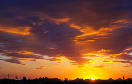Beautiful fiery orange and red sunset sky. の写真素材