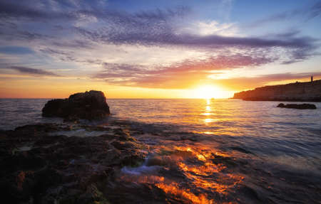 Beautiful summer landscape with sunset, colorful sky and sea. Composition of nature
