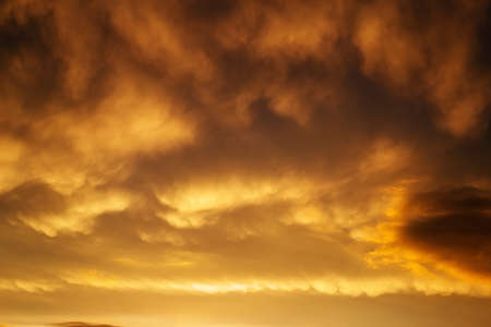 Beautiful stormy sunset sky. Cloudy abstract background. の写真素材