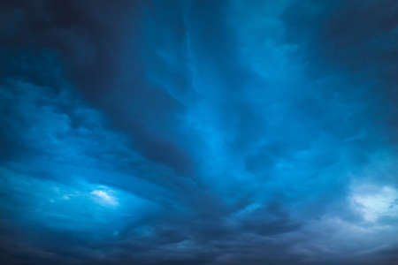 Deep dark sky, storm clouds. Beautiful stormy sky.の写真素材