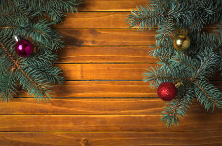 Christmas decorations. Holiday background with fir branches, toy balls. Top view.の写真素材