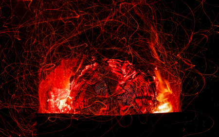 Beautiful coals in the grill. Camping in nature. Fire background