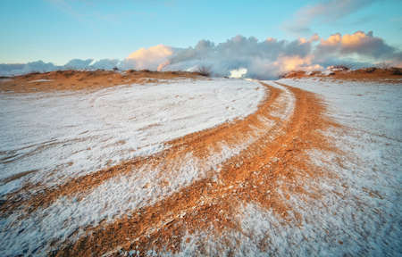 ATV auto sport track at winter. Wheel sandy tracks on snowの写真素材