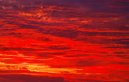 Beautiful Twilight sky background. Colorful Fiery orange and red sunset sky. の写真素材