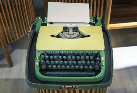 Old typewriter with a sheet of paper in a vintage storeの写真素材