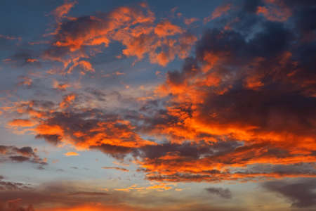 Beautiful Twilight sky background. Colorful Fiery orange and red sunset sky. の写真素材