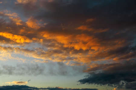 Beautiful Twilight sky background. Colorful Fiery orange and red sunset sky.の写真素材