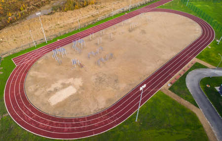 Athletic treadmill and exercise equipment near the school. Sports for health. View from aboveの写真素材