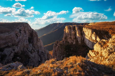 Beautiful mountain landscape. Shooting in the autumn at sunset. Morning hike for good shots.の写真素材