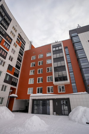 A modern European complex of apartment buildings. Winter. Outdoors.の写真素材