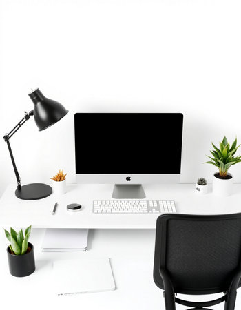 Modern workplace with computer, supplies and coffee cup on white background.の写真素材