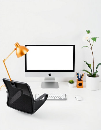 Workplace with computer, lamp and stationery on white background.